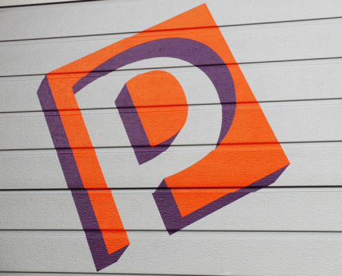 Belettering roldeur