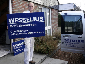 Belettering reclamebord Wesselius